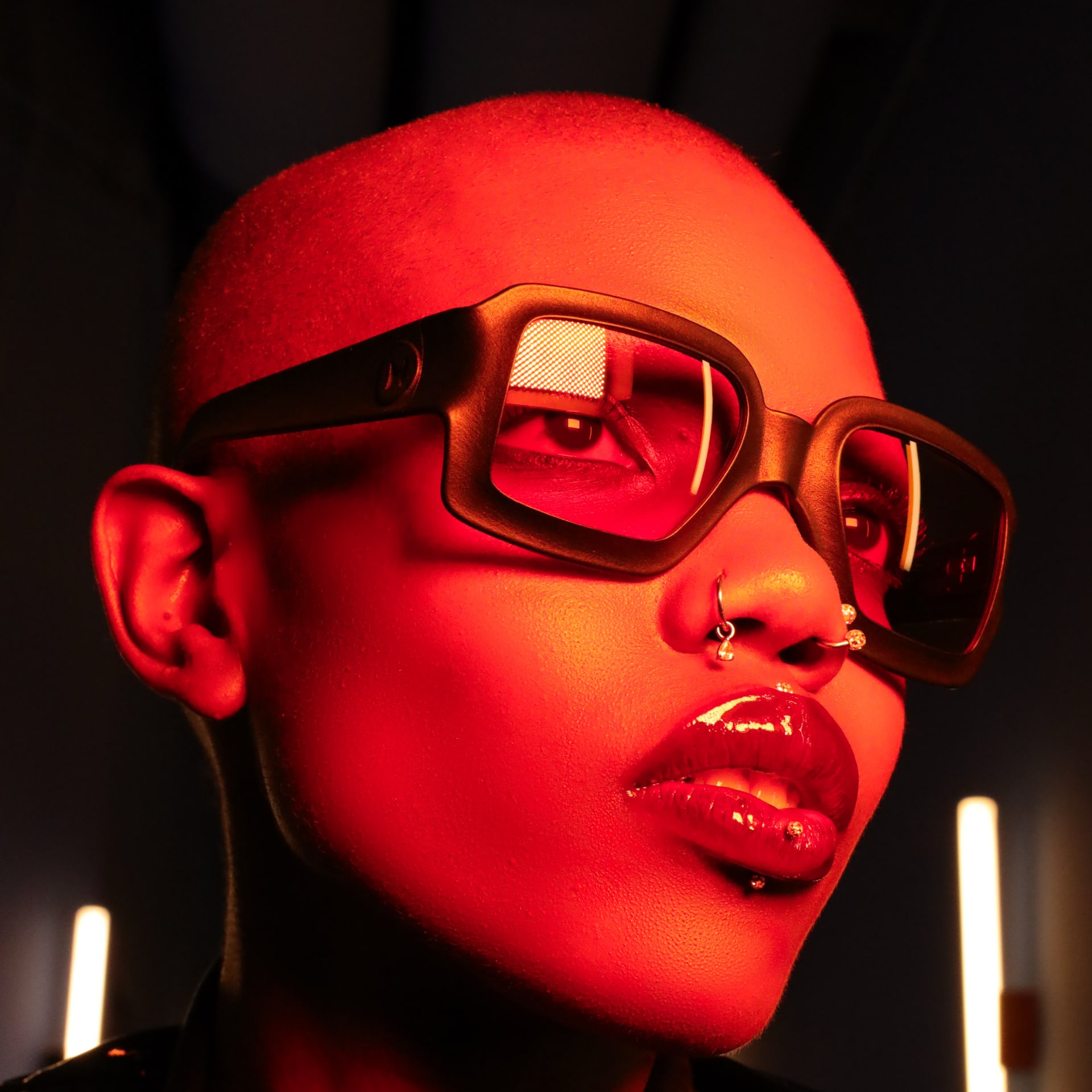 Close-up of REFRAMD Afronaut Eclipse sunglasses highlighting bold geometric frame design